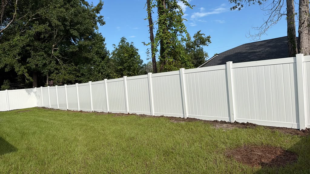 Fence One project: a white privacy fence around a yard